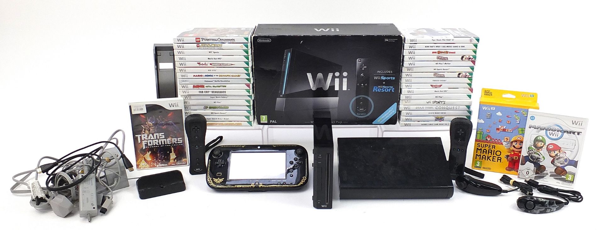 Nintendo Wii games console and Nintendo Wii U games console with a collection of games and