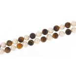 Tiger's eye and cultured pearl necklace, 120cm in length