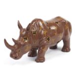 Louise Vuitton style rhinoceros, 51cm in length