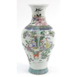 Chinese porcelain baluster vase hand painted in the famille rose palette with figures, six figure