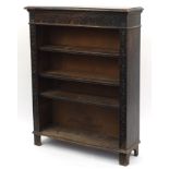 Carved oak open bookcase fitted with three adjustable shelves, 118cm H x 91cm W x 29cm D