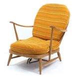 Ercol light elm stick back armchair, 75cm high