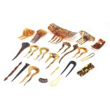 Collection of vintage faux tortoiseshell hair pieces and combs, the largest 19.5cm wide