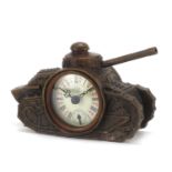 Military interest patinated bronze clock in the form of a tank, 16cm in length