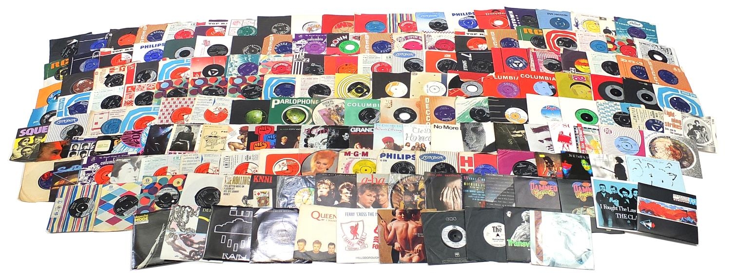 45rpm records including The Beatles, Eddie Cochrane, David Bowie, Kiss and Tommy Tucker