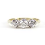 18ct gold diamond three stone ring, the central diamond approximately 0.53 carat, the outer diamonds