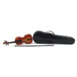 Child's violin bearing a Lark paper label to the interior, with bow and protective case, the