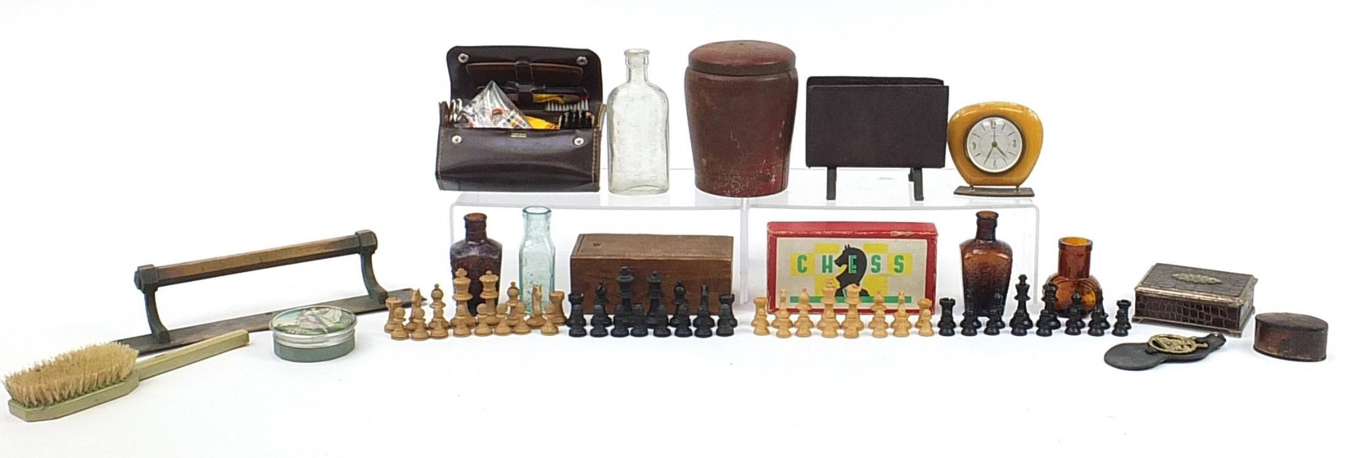 Sundry items including wooden chess sets, Huntley & Palmers biscuit tin and antique glass