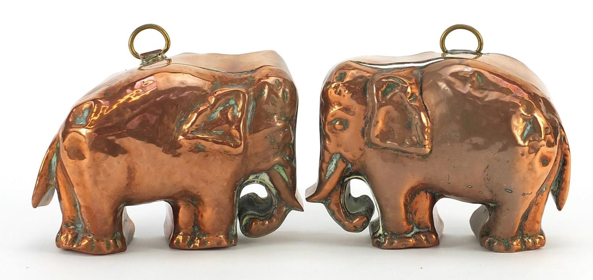 Pair of Victorian copper jelly moulds in the form of elephants, each 16.5cm wide