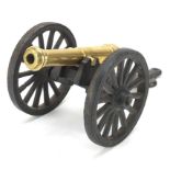 Naval interest cast iron and brass model cannon, 20cm in length