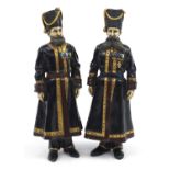 Large pair of cold painted bronze soldiers in Russian military uniform, impressed marks to the