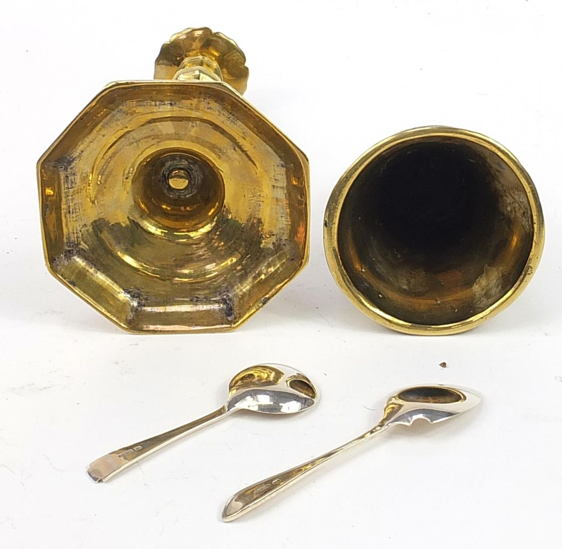 Metalware comprising a heavy gilt brass bell, candlestick and two silver spoons, the largest 23cm - Image 3 of 4