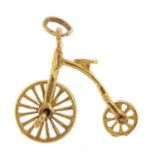9ct gold penny farthing bike charm with rotating wheels, 2.5cm wide, 2.8g