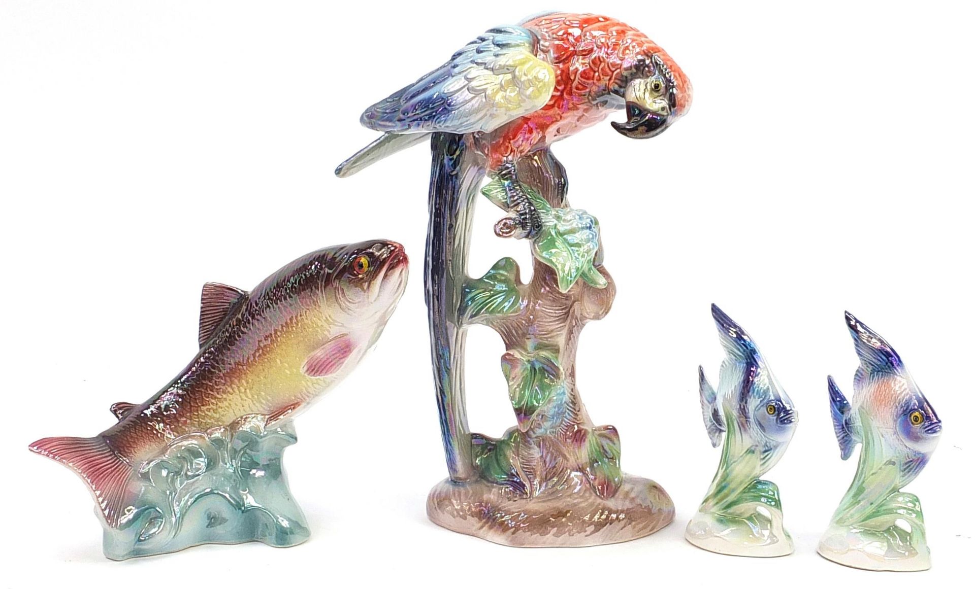 Large Jema of Holland porcelain parrot, leaping salmon and pair of angel fish, the largest 40cm high