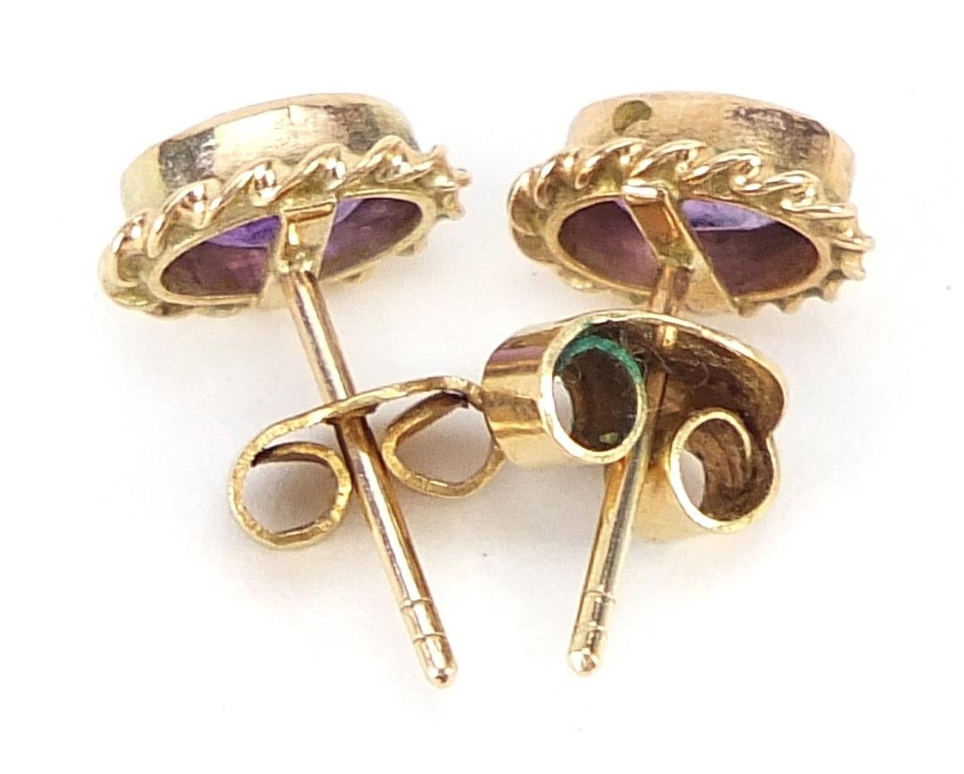 Pair of 9ct gold amethyst stud earrings, 8mm high, 1.1g - Image 2 of 2