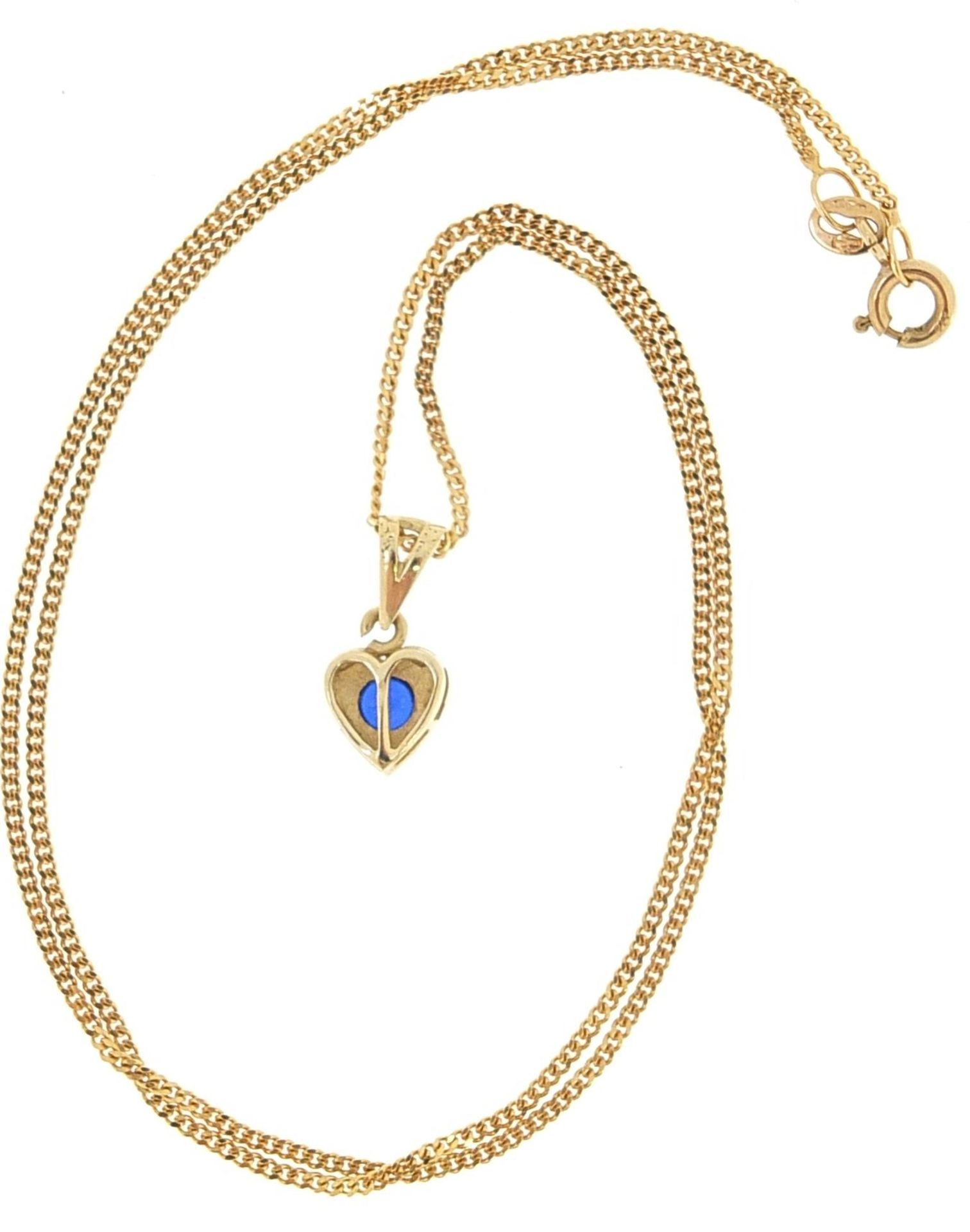 9ct gold necklace with a yellow metal love heart pendant set with a blue stone, 1.4cm high and - Image 3 of 3