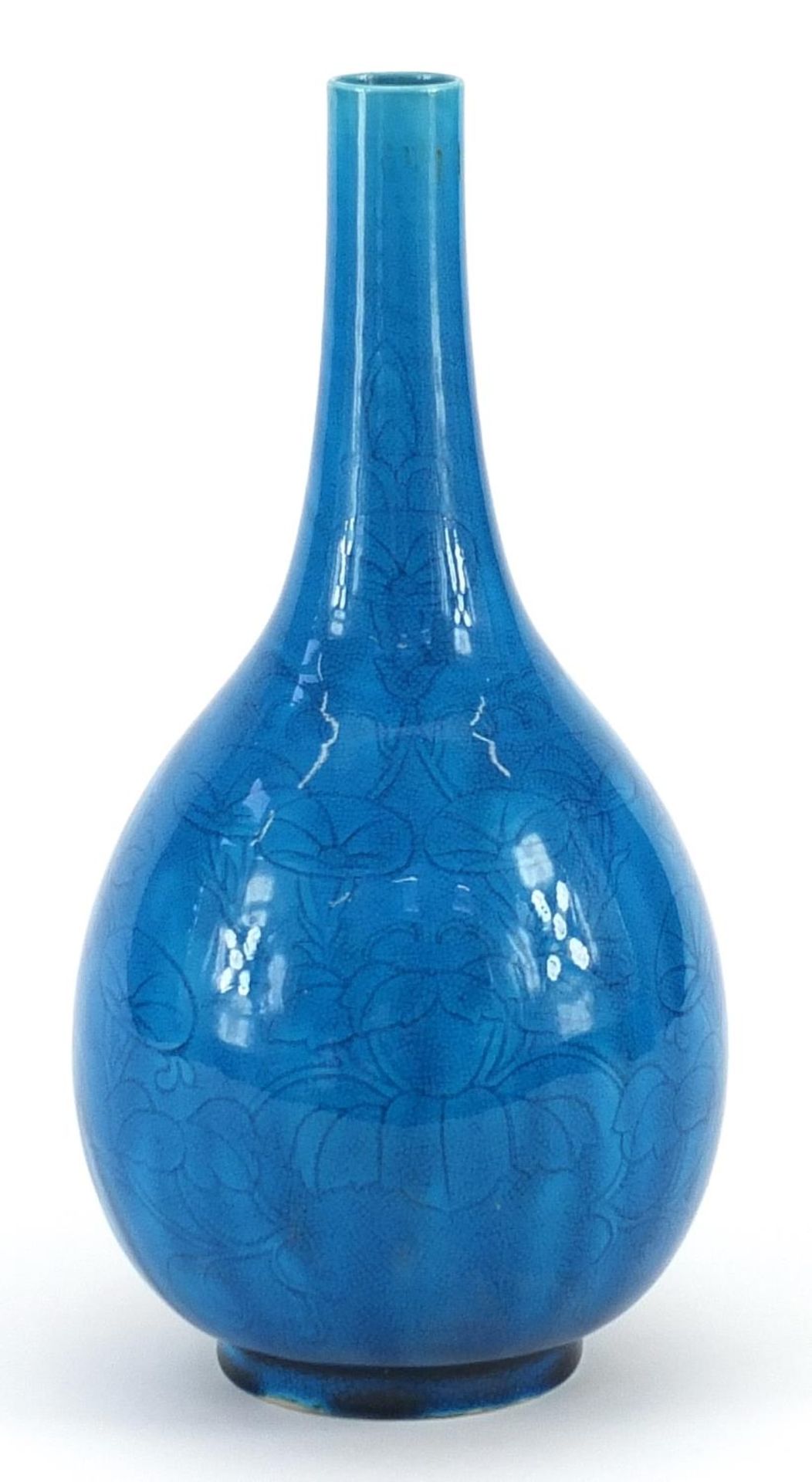 Chinese blue and white porcelain long neck vase incised underglaze with flowers, 25.5cm high