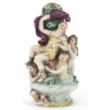 19th century porcelain figural scent bottle in the style of Chelsea, 10.5cm high