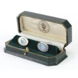 Pair of silver and blue enamel cufflinks housed in a fitted box, 2.0cm high, 13.1g