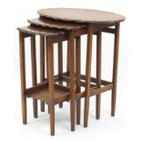 Nest of three mahogany occasional tables with wavy edge, the largest 63cm H x 58cm W x 39.5cm D