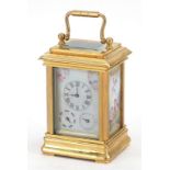 Miniature brass cased carriage clock with Sevres style panels, 9.5cm high