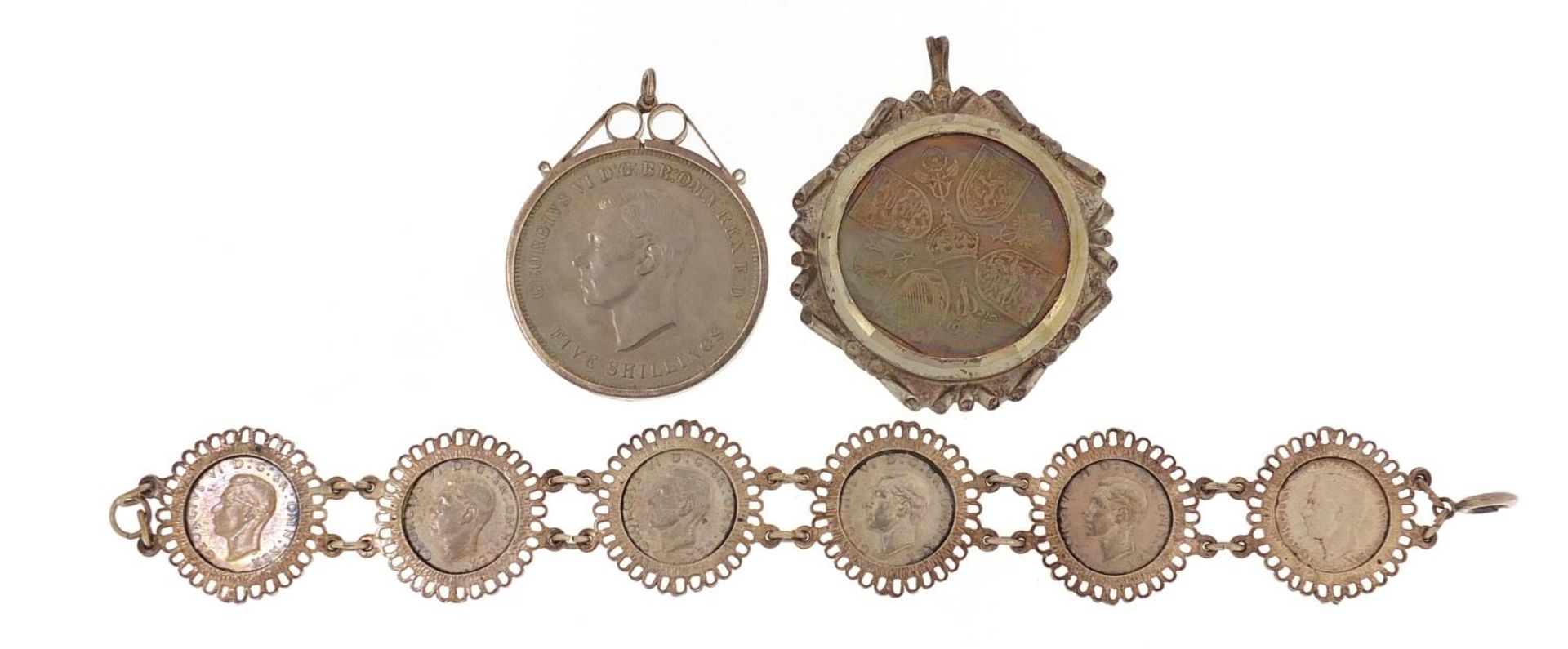 Two five shilling coins with silver pendant mounts and a silver mounted sixpence bracelet, 20cm in