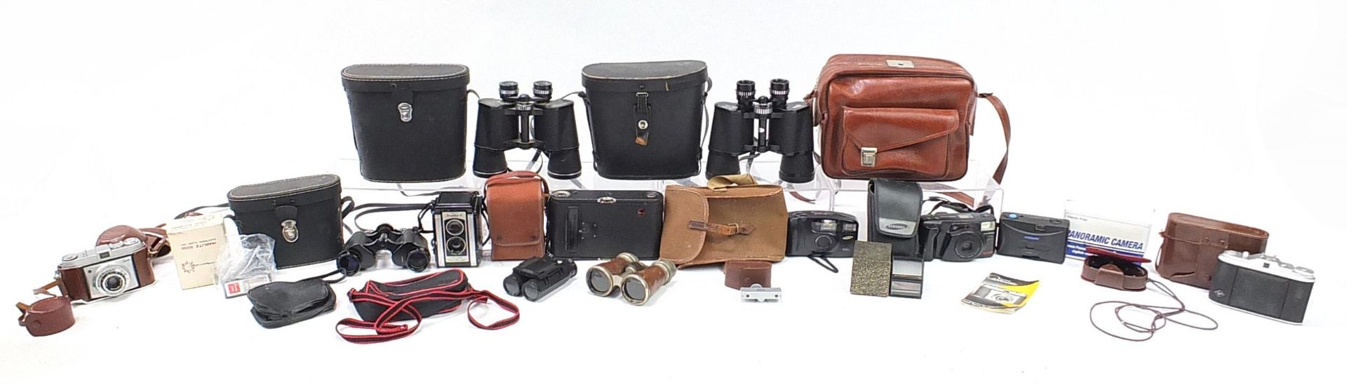 Vintage and later cameras, lenses and binoculars including Kodak, Olympus, Hanimex and Agfa