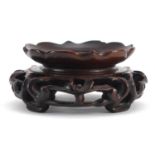 Chinese carved hardwood stand, 8cm in diameter