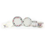 Three Russian porcelain cups and saucers including two made after samples of Sergey Chehonin, the