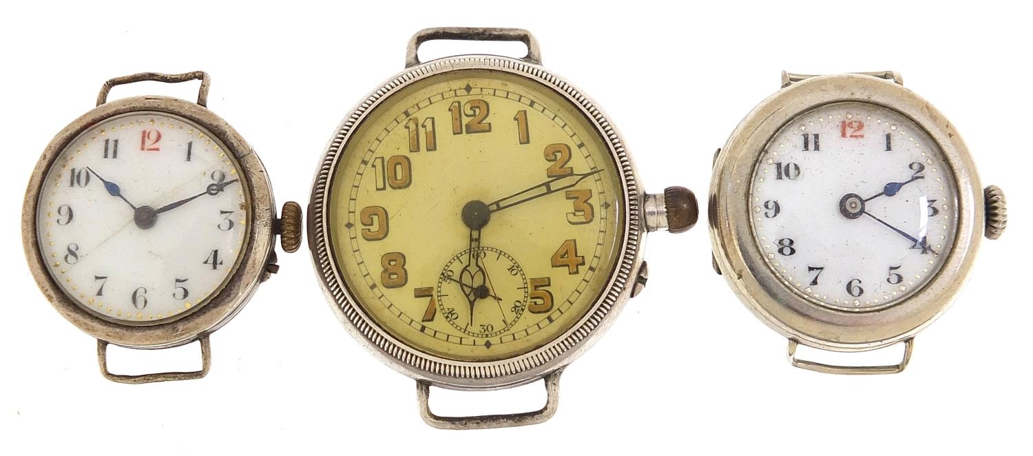 Three silver military interest trench style wristwatches, the largest 35mm in diameter