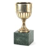 Spanish silver equestrian interest trophy raised on a green marble base, 21cm high, total weight