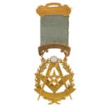 9ct gold masonic jewel set with a diamond presented to Bro James Simpson by the Office Bearers and