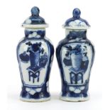 Pair of miniature Chinese blue and white porcelain baluster vases with covers hand painted with