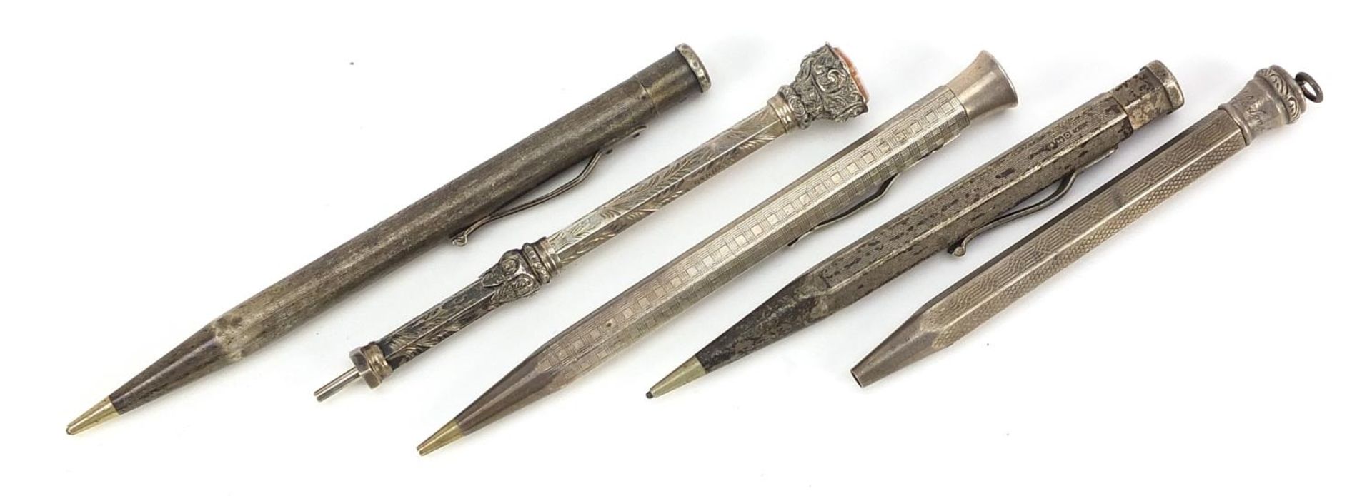 Five antique and later silver propelling pencils including Yard-O-Led, the largest 11.5cm in length