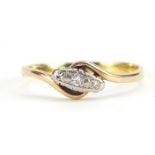 18ct gold diamond crossover ring, size U/V, 2.5g