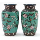 Pair of Japanese cloisonne vases enamelled with birds amongst flowers, each 25cm high
