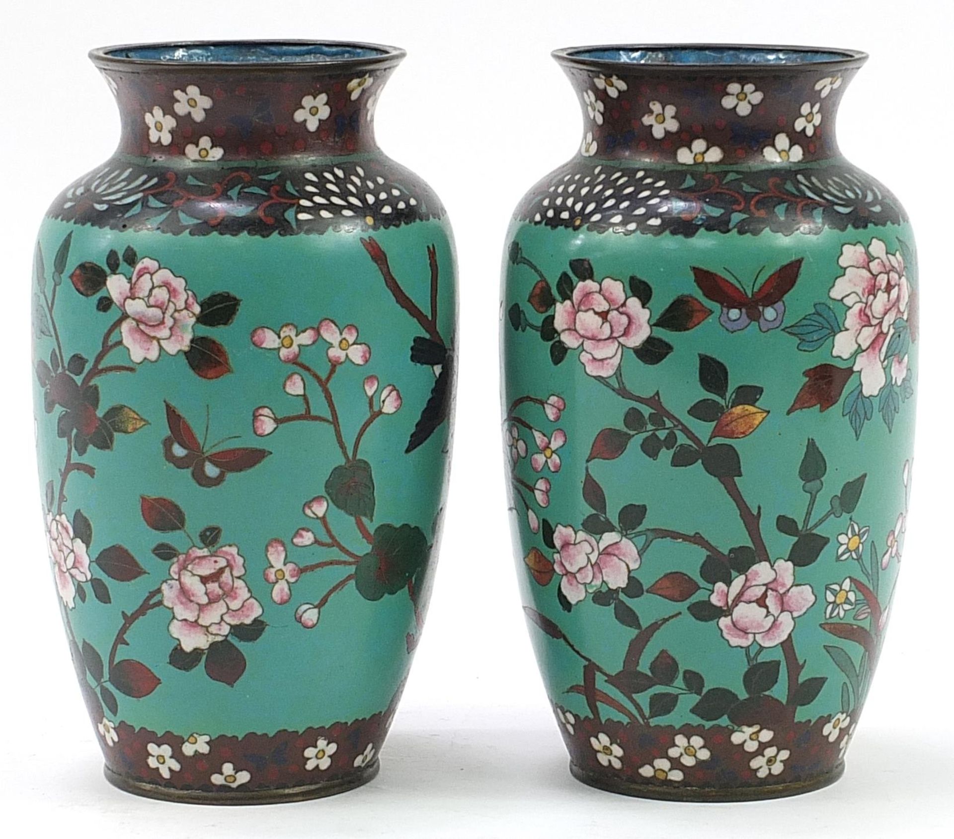 Pair of Japanese cloisonne vases enamelled with birds amongst flowers, each 25cm high