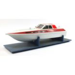 Large remote controlled speedboat shell on display stand, the boat 98cm in length