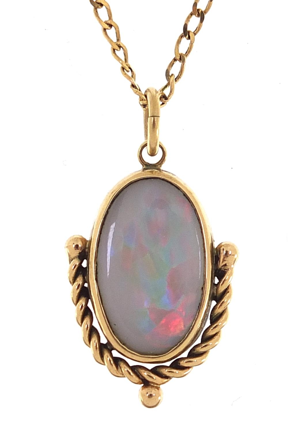 9ct gold opal pendant on a 9ct gold necklace, 2.7cm high and 46cm in length, 4.7g