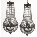 Pair of ornate bronzed metal chandelier design wall lights with bows, 50cm high