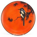 F Henri, Royal Doulton flambe charger hand painted with a magpie on a branch, 31cm in diameter
