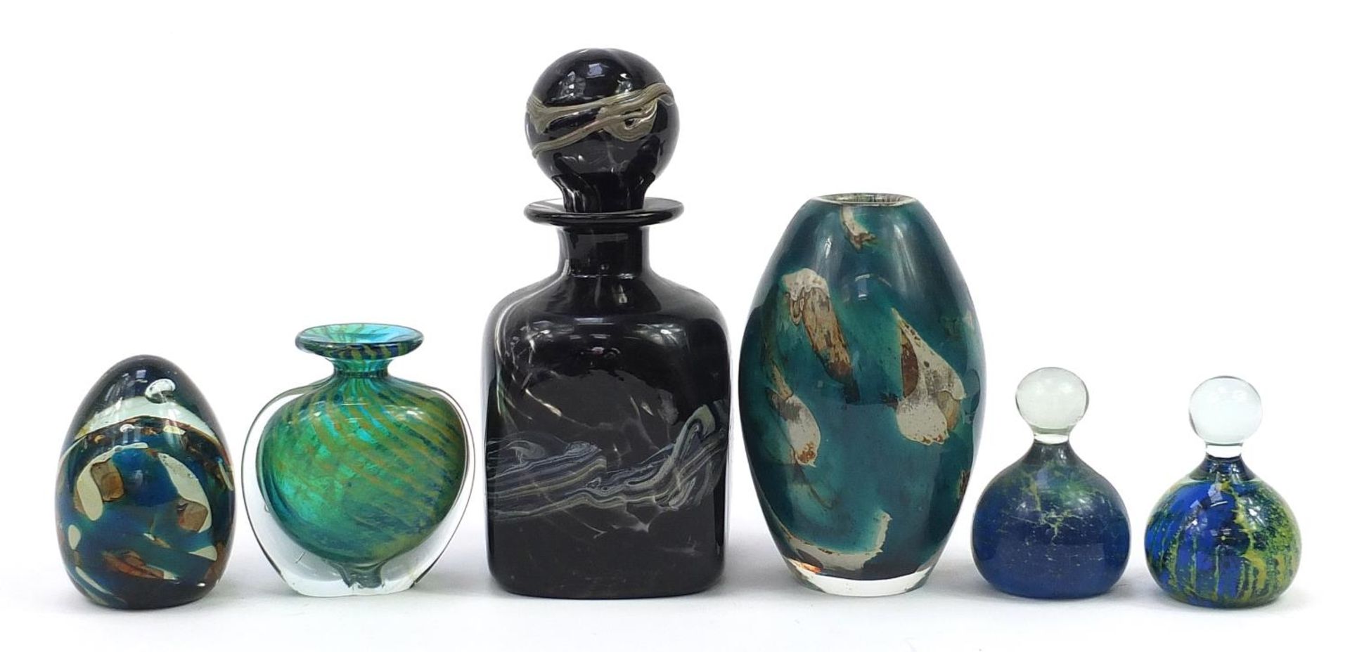 Mdina glassware comprising decanter with stopper, two vases and three paperweights, the largest 22.