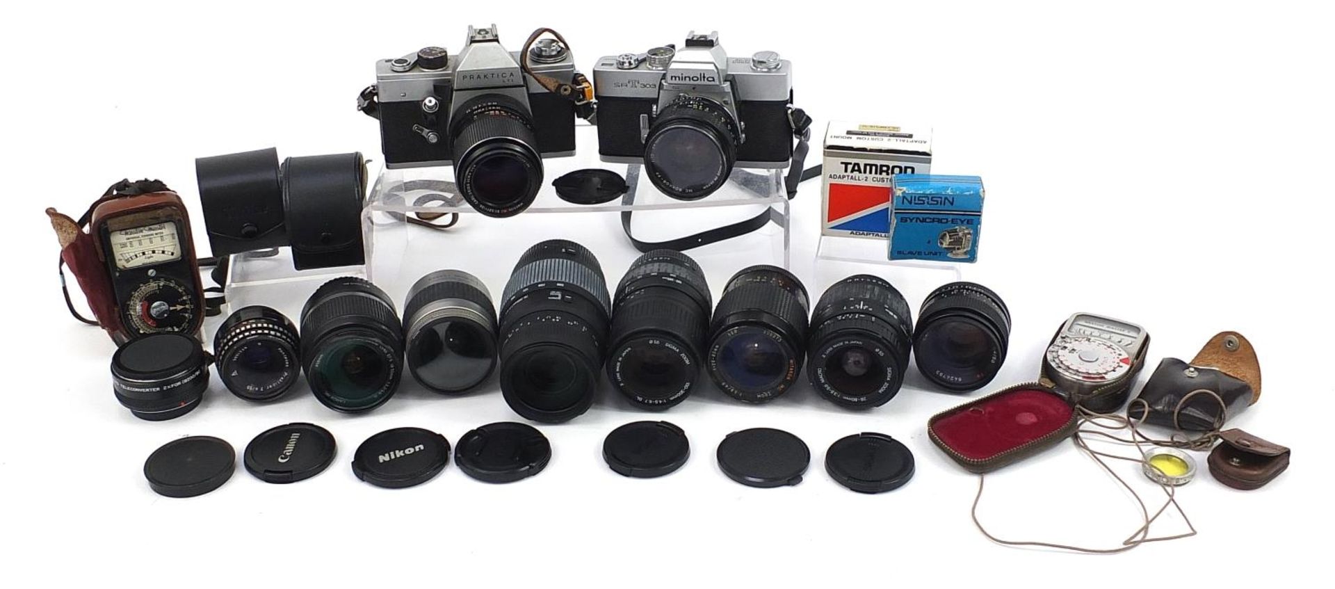 Vintage and later cameras, lenses and accessories including Minolta SRT303, Praktica, Sigma and