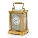 Miniature brass cased carriage clock with Sevres style panels and swing handle, 7.5cm high