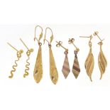 Four pairs of 9ct gold and yellow metal earrings including a 9ct gold three tone example, the
