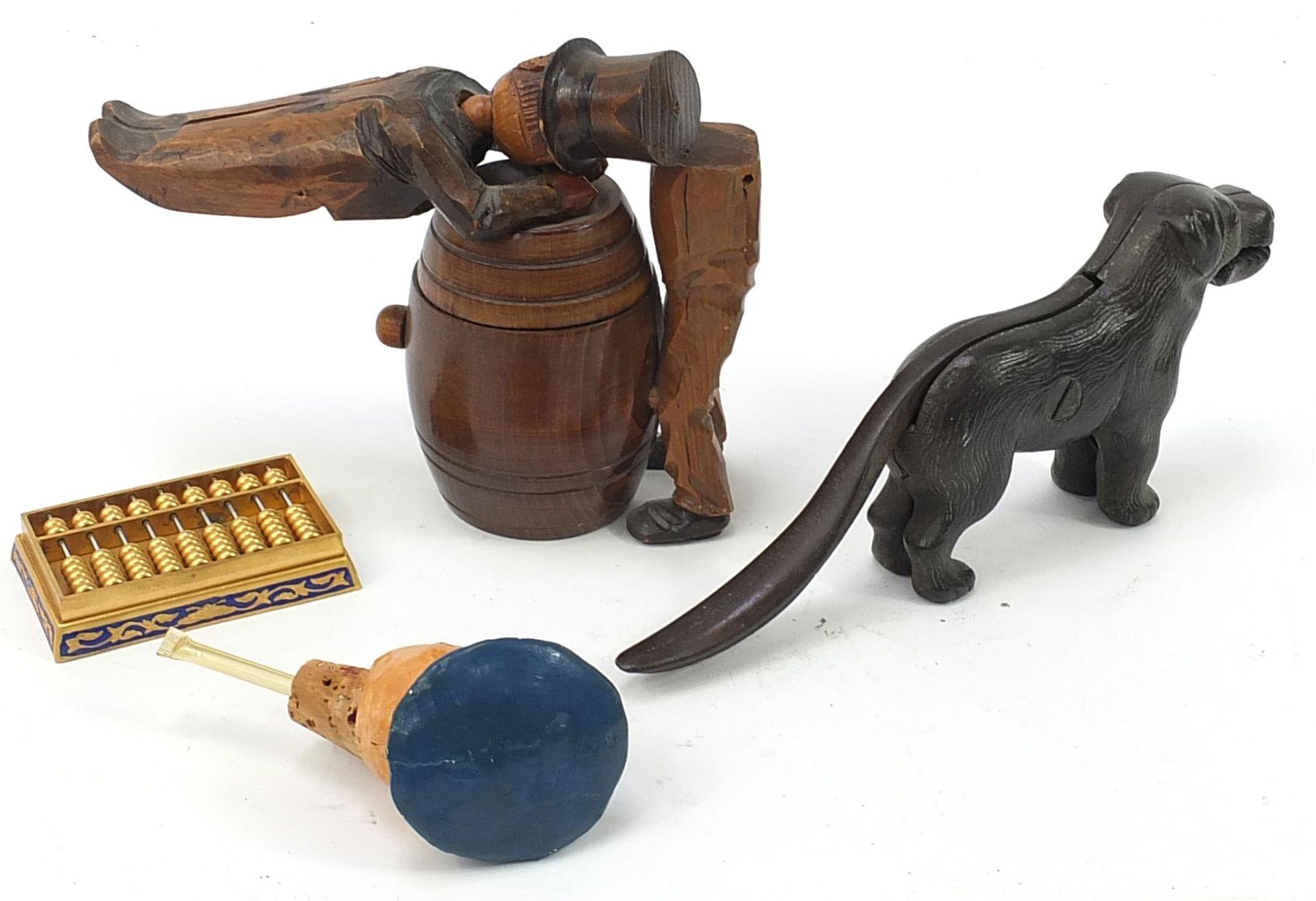 Objects including novelty Black Forest man on a barrel with box and cover, pair of dog nutcrackers - Image 2 of 3