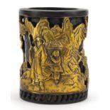 Chinese partially gilt patinated bronze brush pot decorated in relief with figures in a landscape,