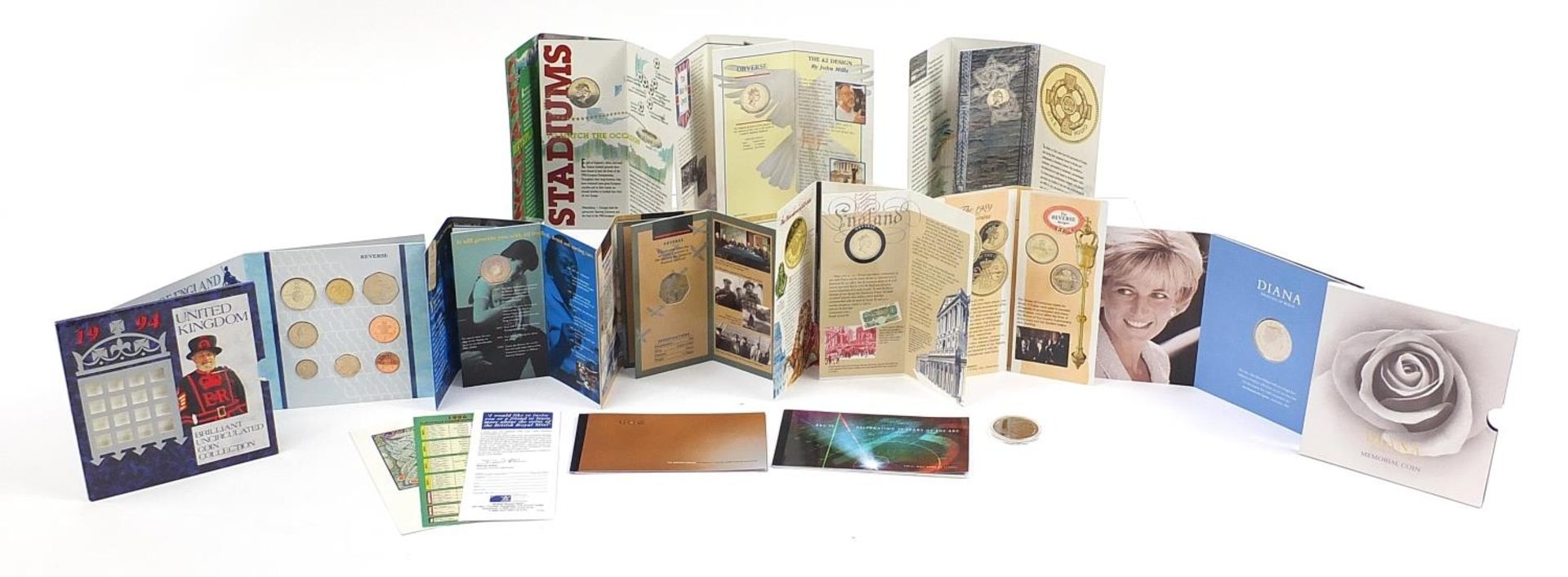 Uncirculated and proof British coinage and Royal Mail 75 Years of the BBC book of stamps including