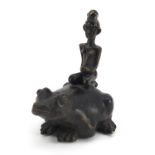 Tribal interest patinated bronze study of a tribesman on frog, 10cm high