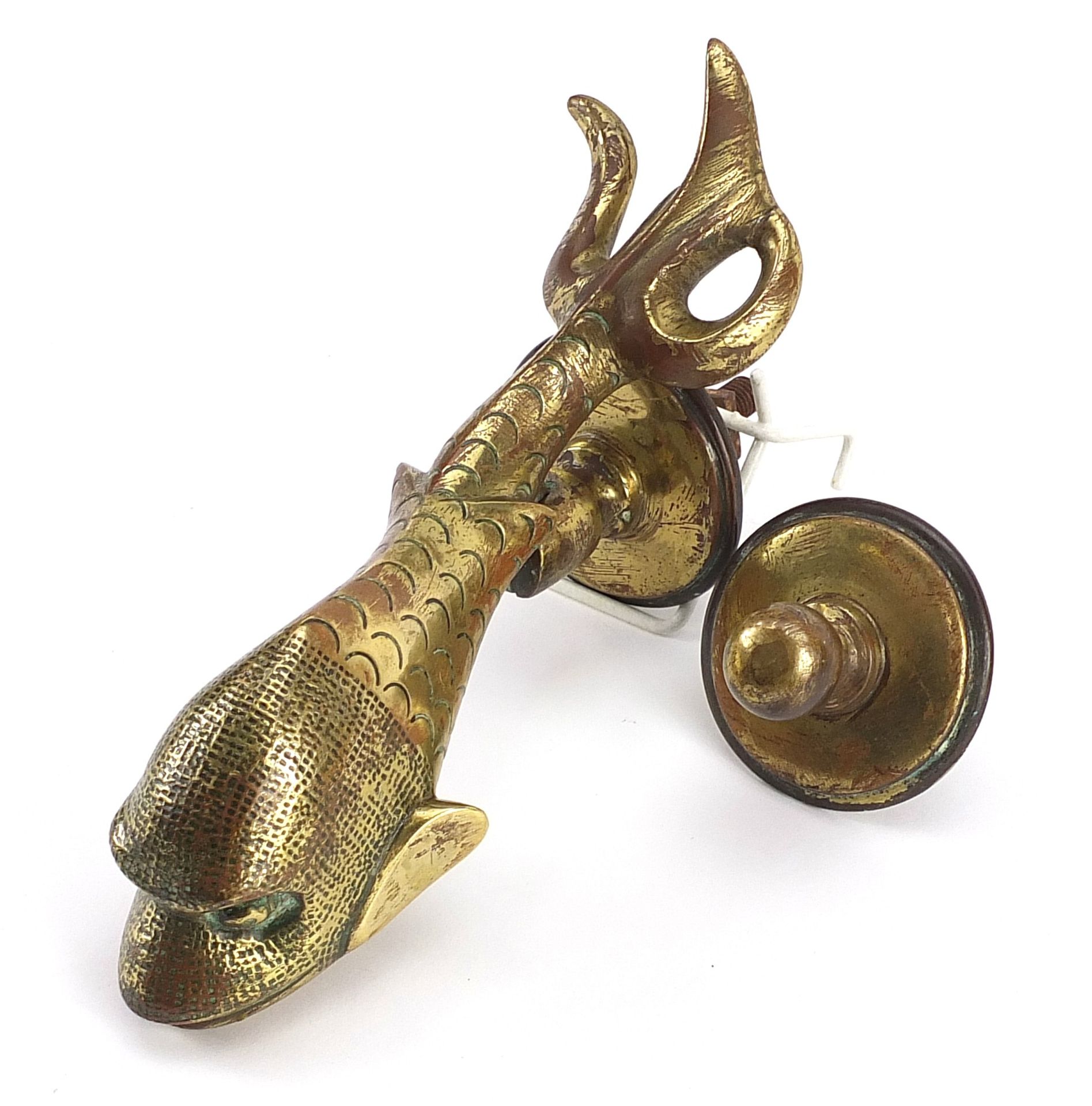 Regency gilt brass dolphin door knocker, 22cm high